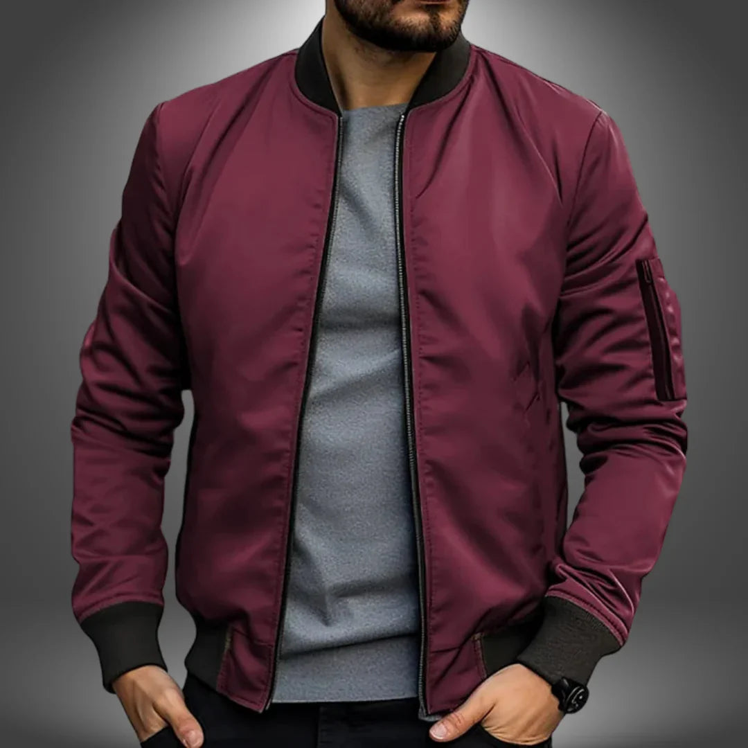 "Miesten kevyt tuulitakkityylinen bomber-takki, minimalistinen design, ribbaus hihansuissa, vetoketjullinen tasku"