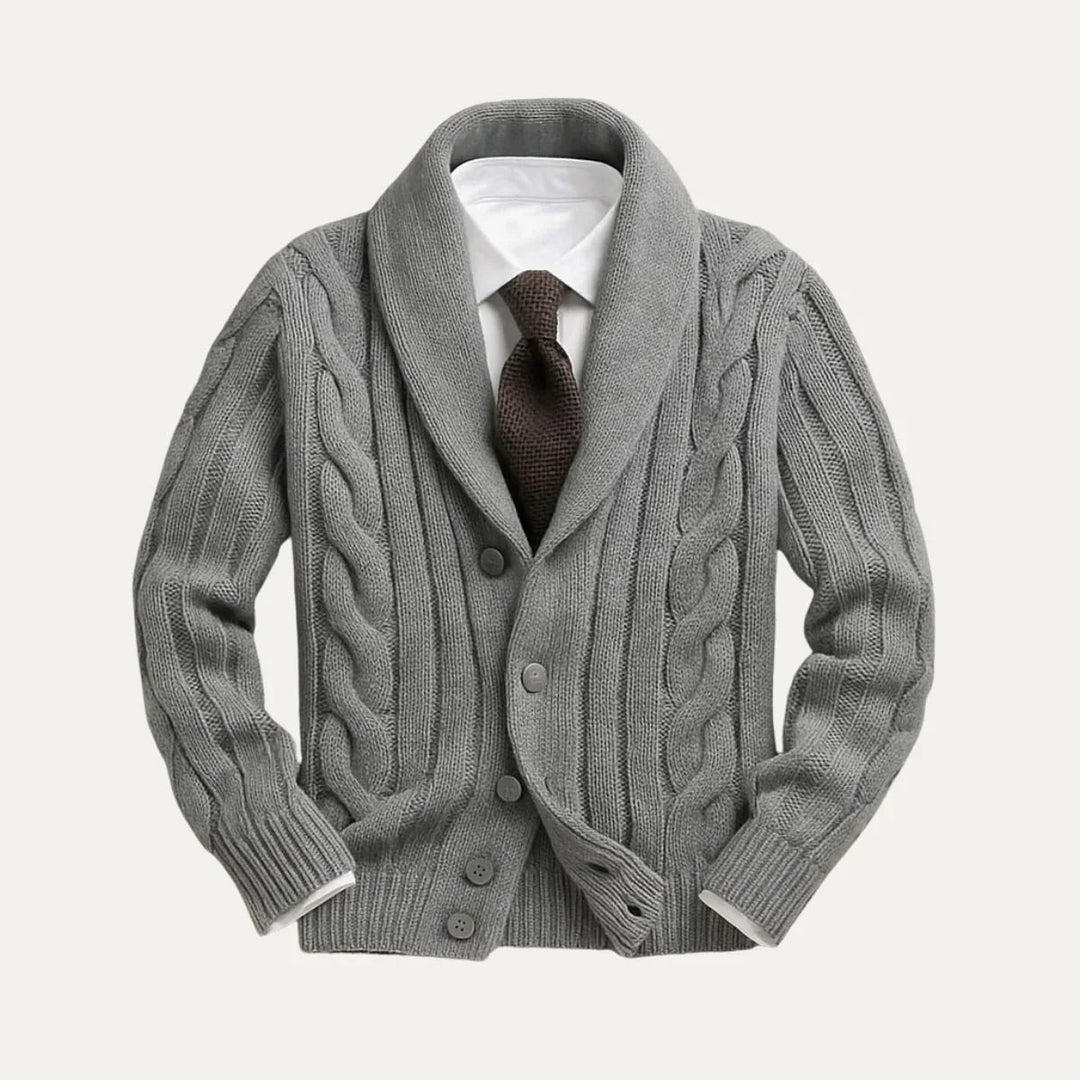 "Miesten merinovillainen cardigan, istuva malli, harmaa väri, edestä kuvattuna. Tyylikäs ja monikäyttöinen vaatetus."