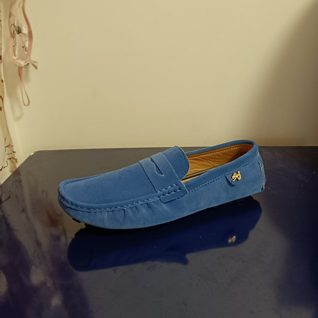 Miesten mokkasiinit hengittävällä kankaalla, pyöreä kärki, ergonominen mukavuus ja tyylikäs design.