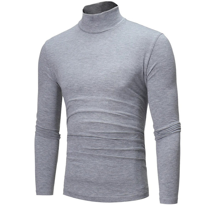 "Miesten musta slim-fit korkeakauluksinen lämpöpaita, pitkähihaiset, moderni malli talvivalikoimaan."