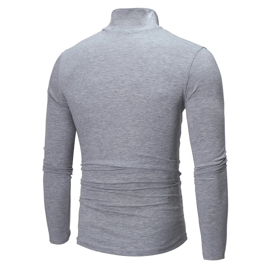 "Miesten musta slim-fit korkeakauluksinen lämpöpaita, pitkähihaiset, moderni malli talvivalikoimaan."