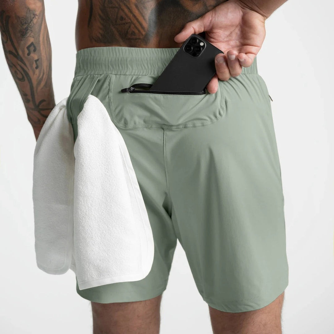 Herre hurtigttørrende sportsshorts, let ensfarvet design, elastisk linning, perfekt til træning.