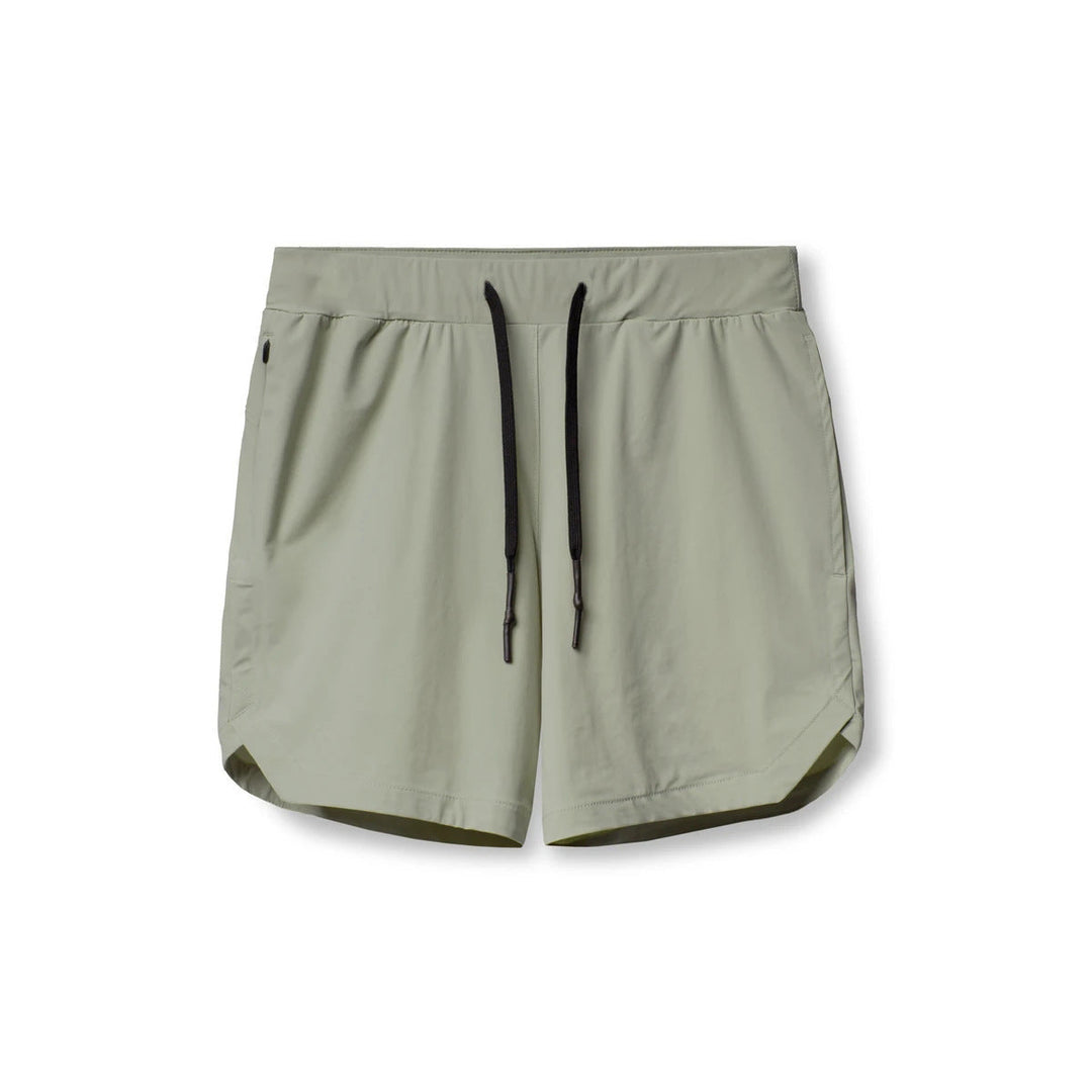 Herre hurtigttørrende sportsshorts, let ensfarvet design, elastisk linning, perfekt til træning.
