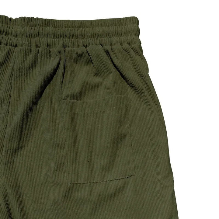 "Miesten retro corduroy -cargoshortsit, yksiväriset ja rento istuvuus, vintage-henkinen tekstuuri ja käytännölliset taskut."