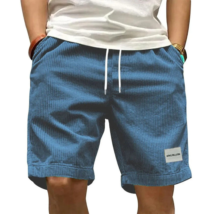 "Miesten retro corduroy -cargoshortsit, yksiväriset ja rento istuvuus, vintage-henkinen tekstuuri ja käytännölliset taskut."