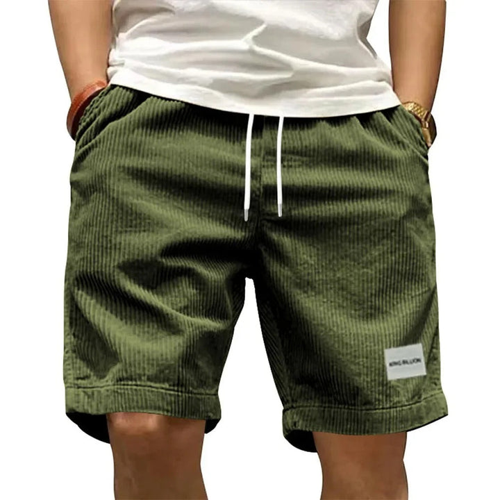 "Miesten retro corduroy -cargoshortsit, yksiväriset ja rento istuvuus, vintage-henkinen tekstuuri ja käytännölliset taskut."