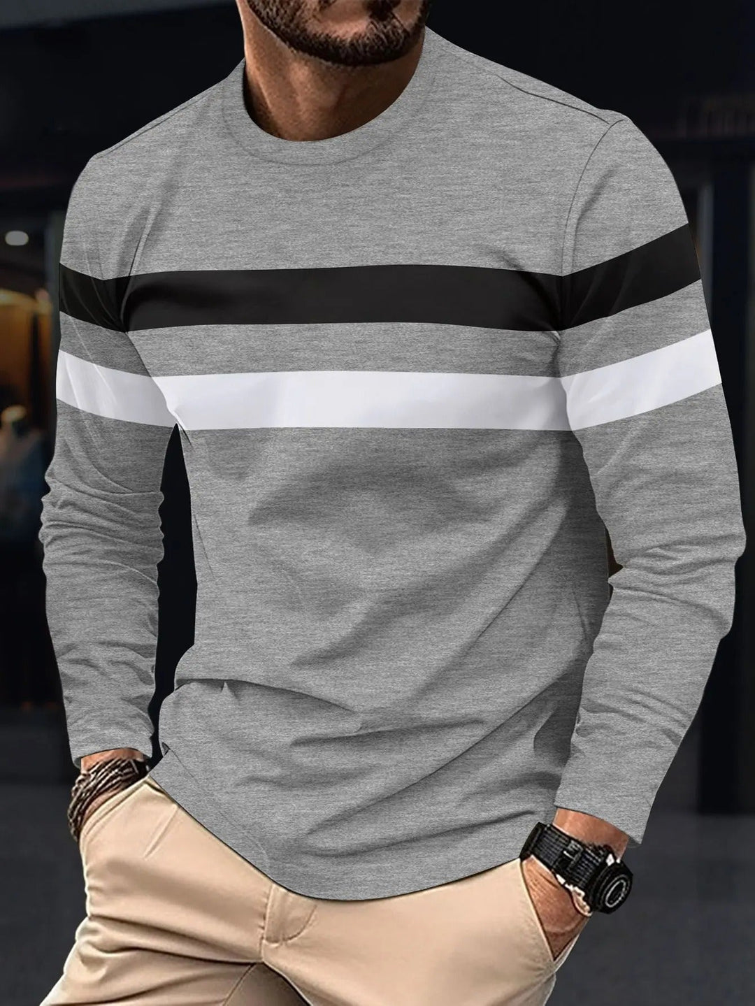 Miesten ryppyjä estävä pitkähihainen T-paita, tummat kontrastivärit, pyöreä kaulus, business-casual look.