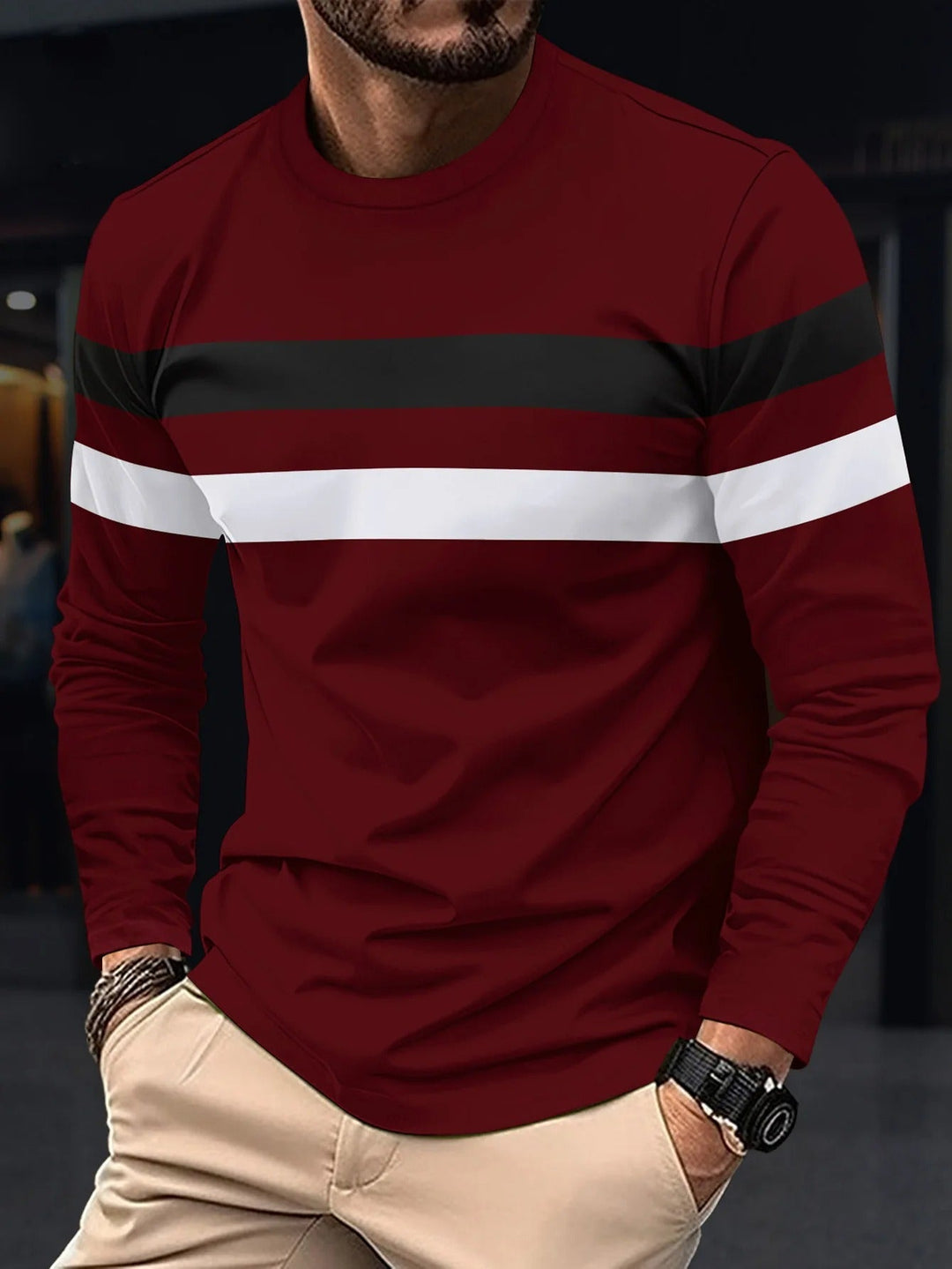 Miesten ryppyjä estävä pitkähihainen T-paita, tummat kontrastivärit, pyöreä kaulus, business-casual look.