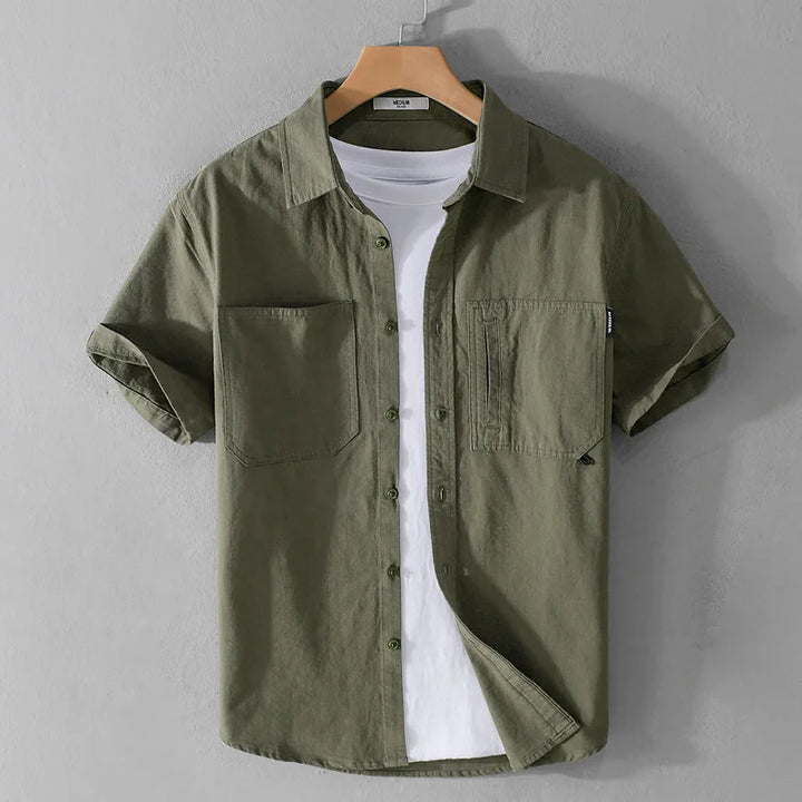 Miesten safari kesäpaita, puuvillaa, käännettävällä kauluksella, khaki. Kevyt ja hengittävä materiaali, rennot taskut.