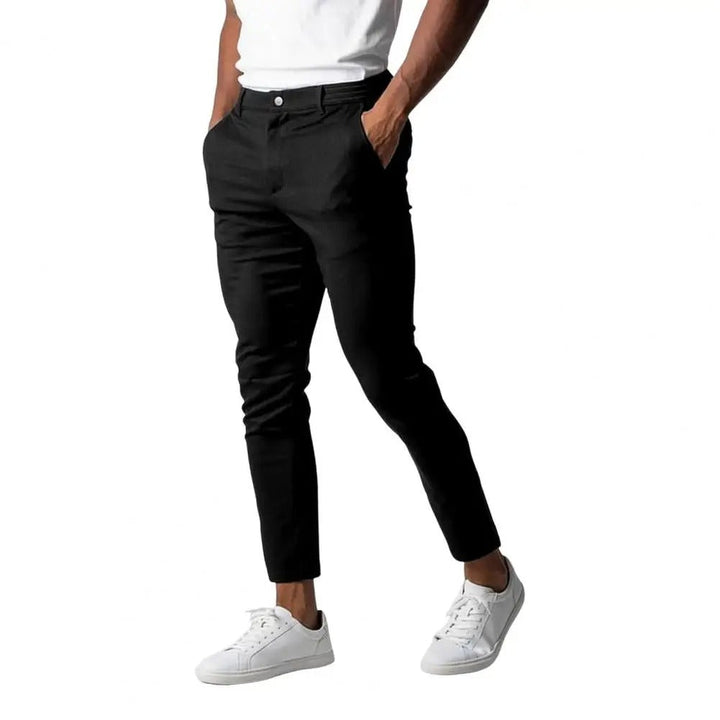 "Miesten slim-fit business-housut, joustava vyötärö, harmaa, elegantti siluetti, moderni muotoilu, monipuolinen yksivärisyys"