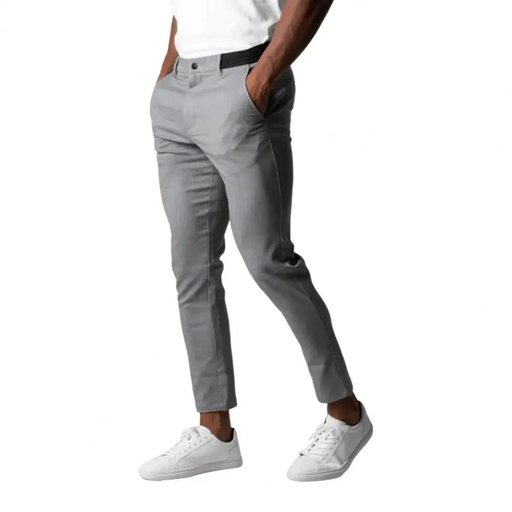 "Miesten slim-fit business-housut, joustava vyötärö, harmaa, elegantti siluetti, moderni muotoilu, monipuolinen yksivärisyys"