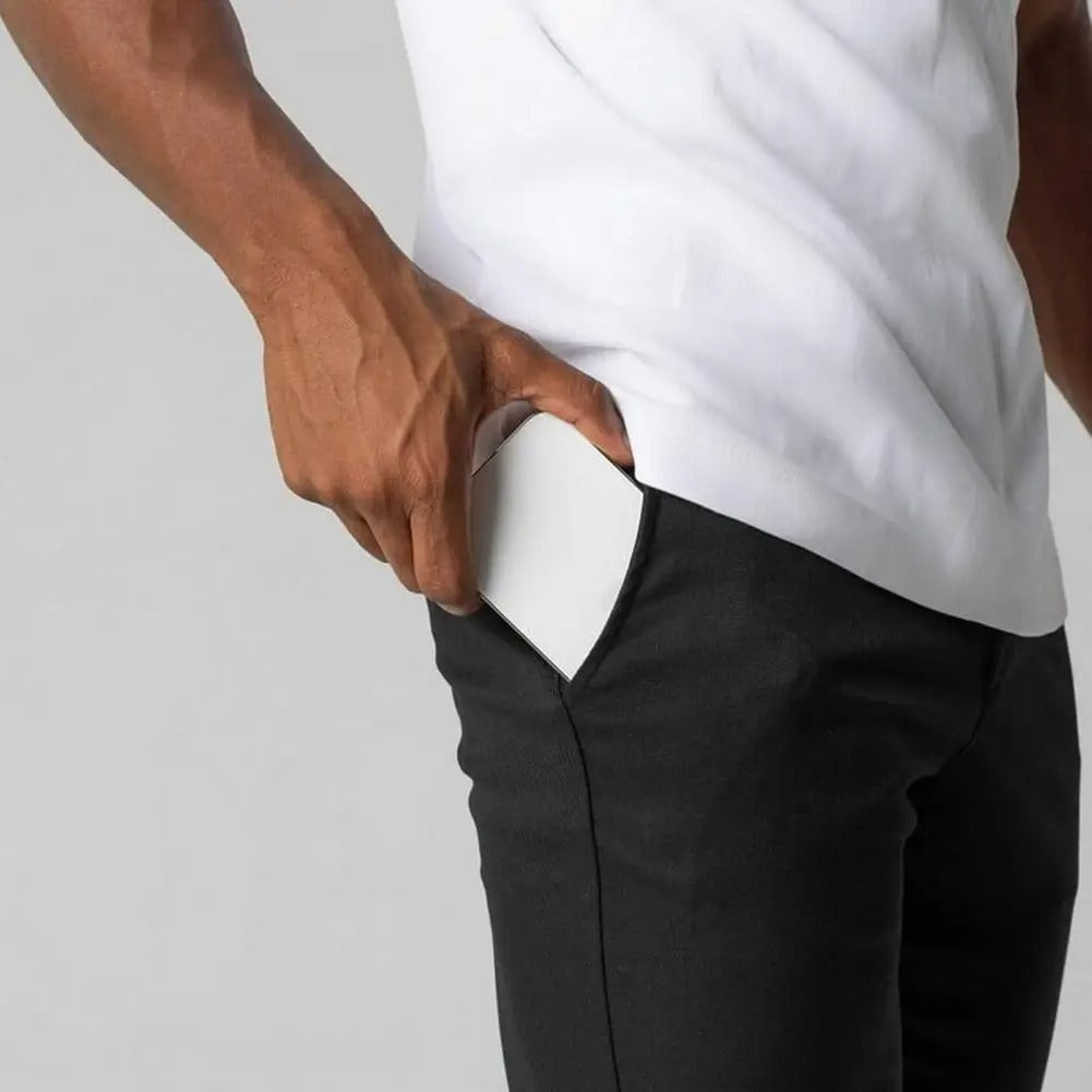 "Miesten slim-fit business-housut, joustava vyötärö, harmaa, elegantti siluetti, moderni muotoilu, monipuolinen yksivärisyys"