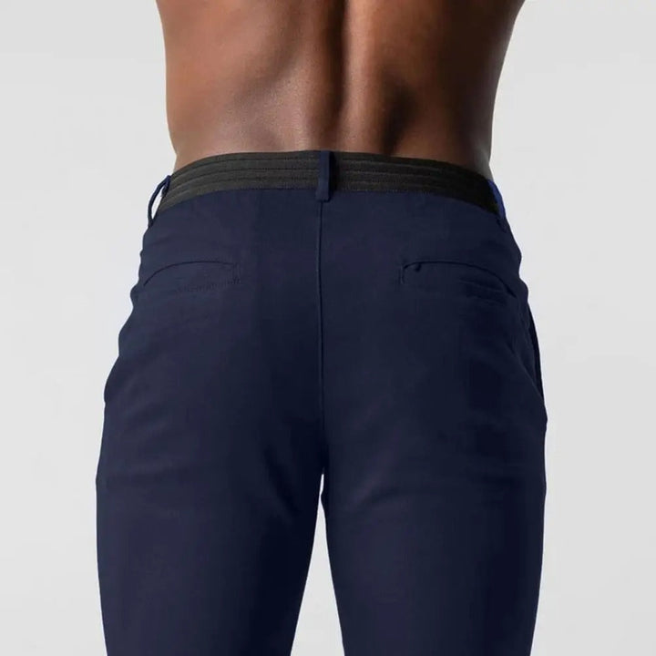 "Miesten slim-fit business-housut, joustava vyötärö, harmaa, elegantti siluetti, moderni muotoilu, monipuolinen yksivärisyys"