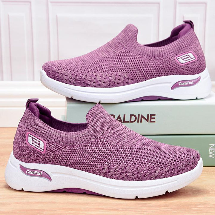 Mænds slip-on sneakers, åndbart stof, let og alsidigt design, velegnet til fritid og let sport.