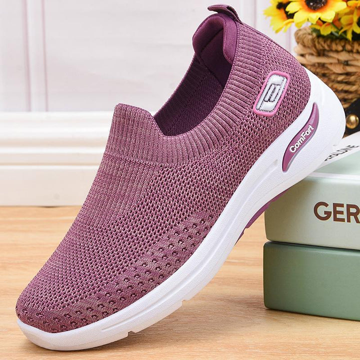 Mænds slip-on sneakers, åndbart stof, let og alsidigt design, velegnet til fritid og let sport.