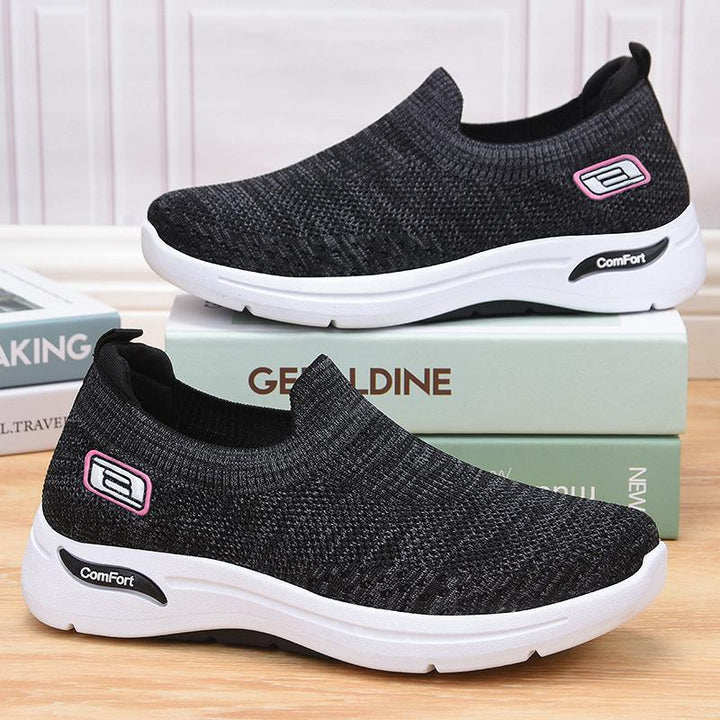 Mænds slip-on sneakers, åndbart stof, let og alsidigt design, velegnet til fritid og let sport.