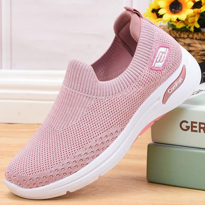 Mænds slip-on sneakers, åndbart stof, let og alsidigt design, velegnet til fritid og let sport.