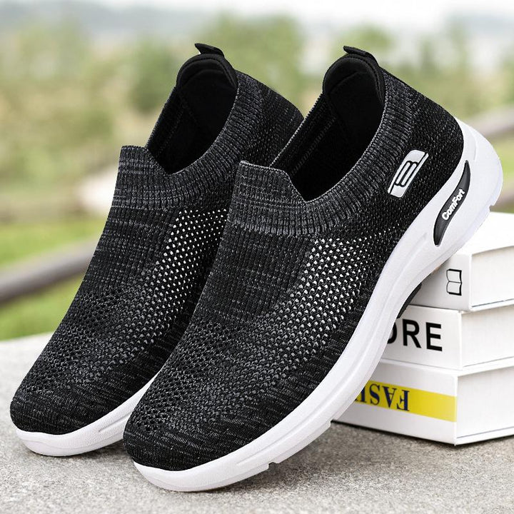 Mænds slip-on sneakers, åndbart stof, let og alsidigt design, velegnet til fritid og let sport.