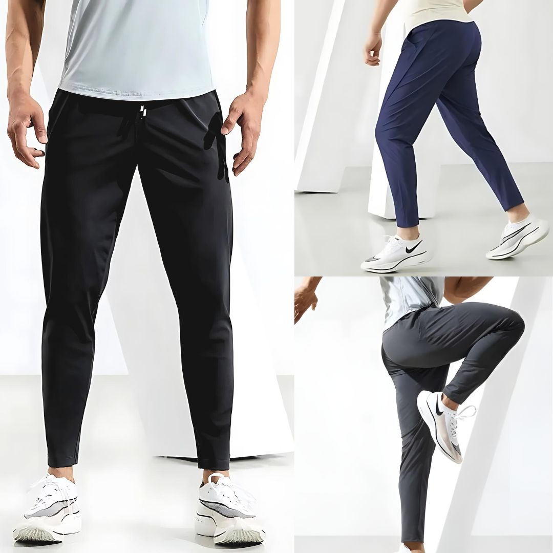 Miesten tapered fit juoksuhousut, kosteutta siirtävä materiaali, joustava vyötärö, moderni leikkaus, vetoketjulliset taskut.