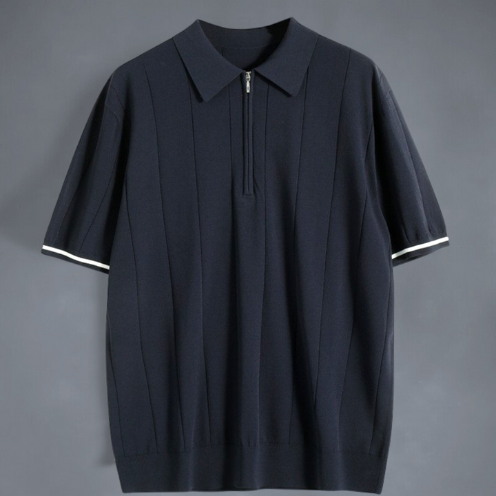 Miesten tummansininen ja valkoinen puuvillainen polo, pehmeä materiaali, tyylikäs ilme, neljännesvetoketju.