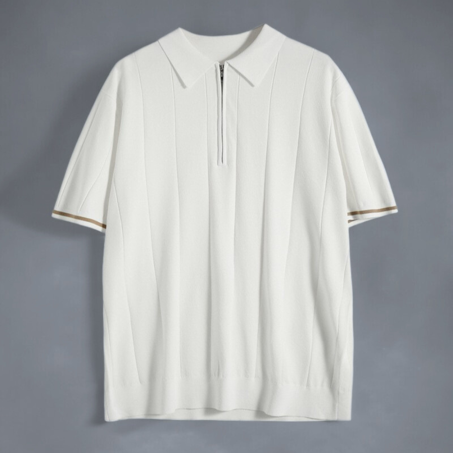Miesten tummansininen ja valkoinen puuvillainen polo, pehmeä materiaali, tyylikäs ilme, neljännesvetoketju.
