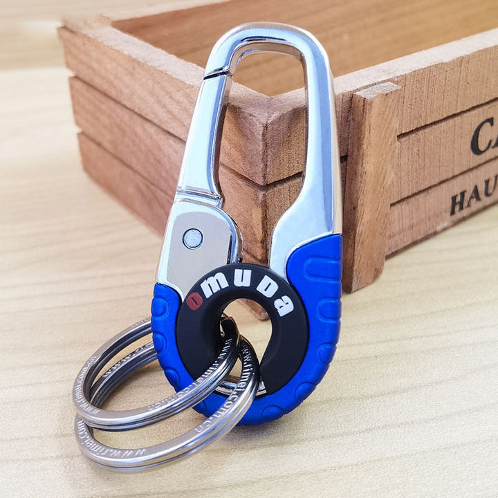 Mænds stilfulde nøglering i rustfrit stål, orange og blå, elegant og holdbar nøgleopbevaringsløsning.