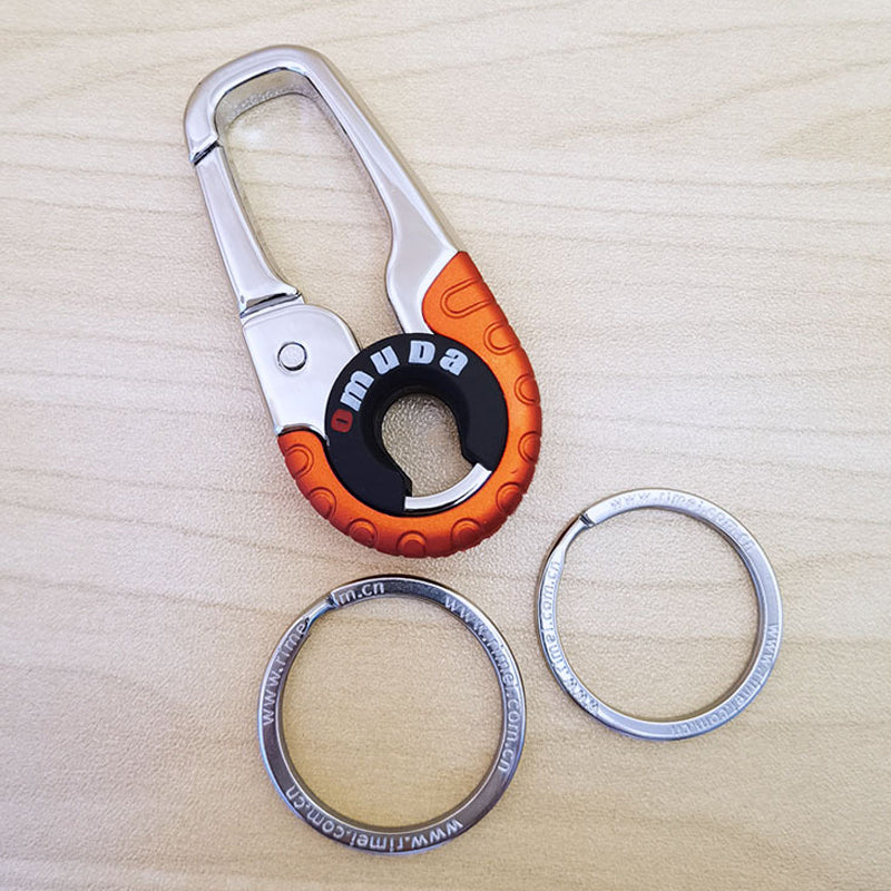 Mænds stilfulde nøglering i rustfrit stål, orange og blå, elegant og holdbar nøgleopbevaringsløsning.
