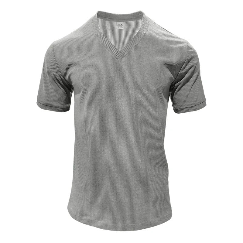 "Miesten vakosamettinen slim fit V-kaula-t-paita, pehmeä vakosamettikangas, tyylikäs muotoilu, lyhythihainen malli."