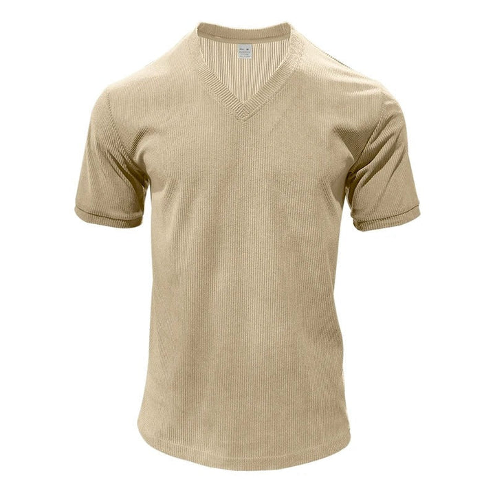 "Miesten vakosamettinen slim fit V-kaula-t-paita, pehmeä vakosamettikangas, tyylikäs muotoilu, lyhythihainen malli."