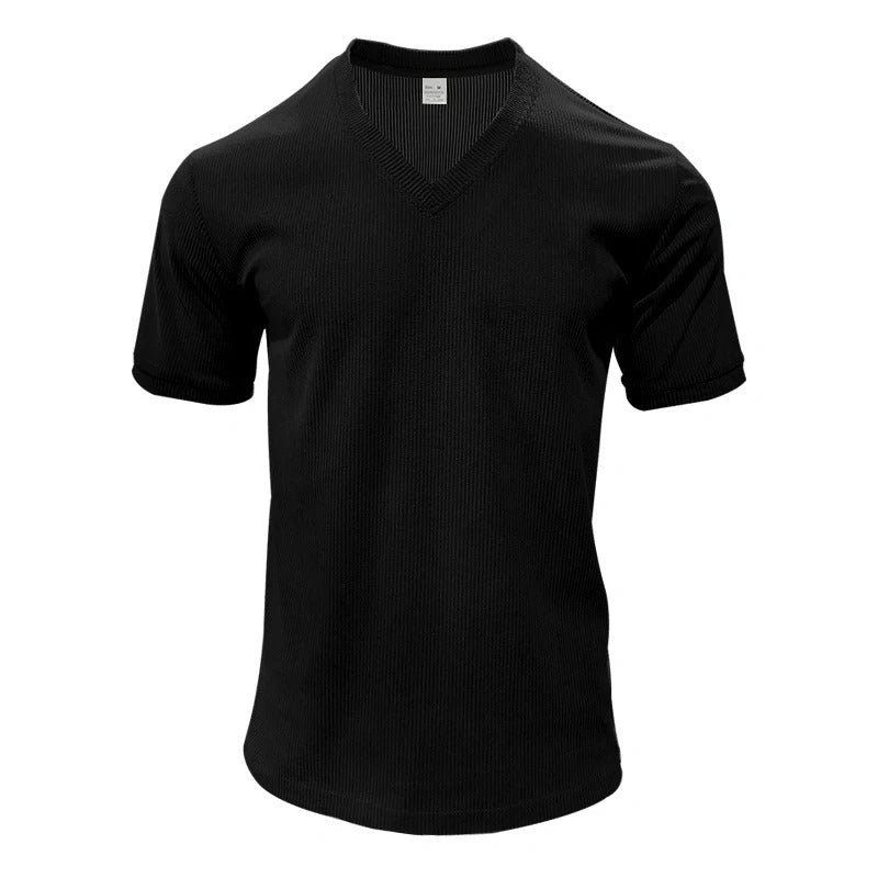 "Miesten vakosamettinen slim fit V-kaula-t-paita, pehmeä vakosamettikangas, tyylikäs muotoilu, lyhythihainen malli."