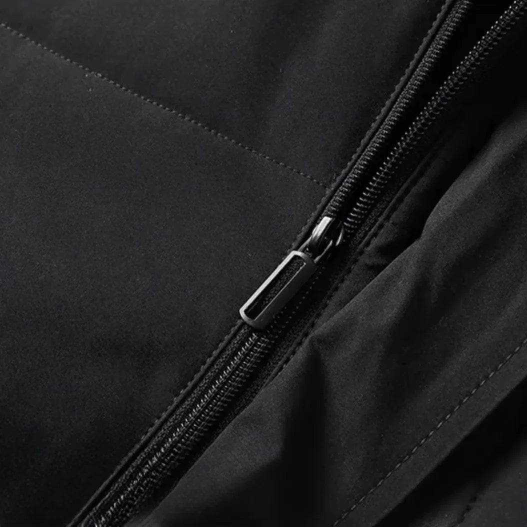 Herre vandtæt fleece vinterjakke, sort, varm fleeceforing, stilfuld og maskulin silhuet