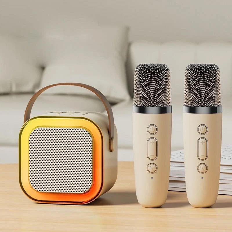 Mini karaokemaskine, trådløse mikrofoner, elegant design, flerfarvet, perfekt til musikelskere og fester.