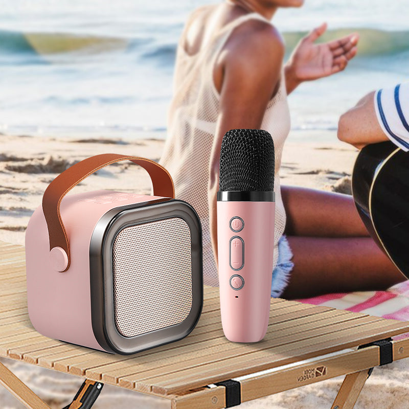 Mini karaokemaskine, trådløse mikrofoner, elegant design, flerfarvet, perfekt til musikelskere og fester.