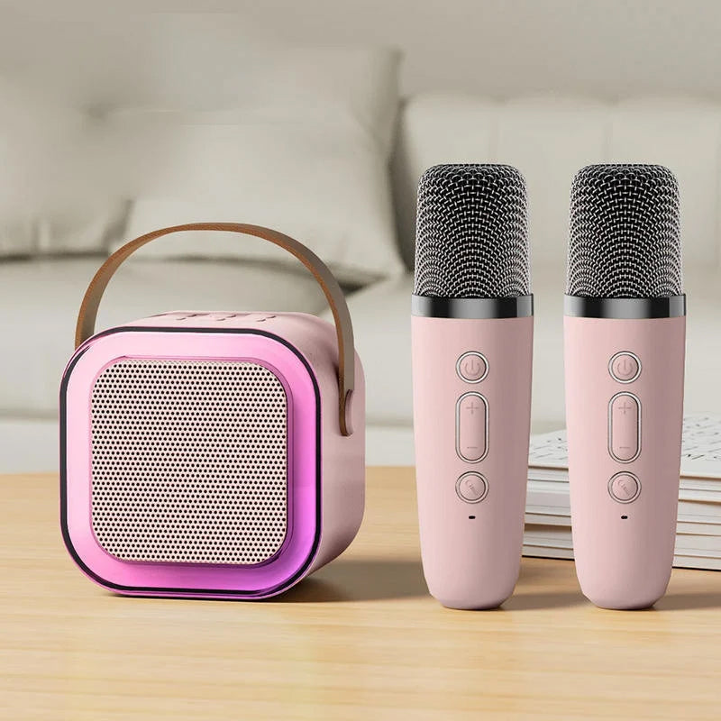 Mini karaokemaskine, trådløse mikrofoner, elegant design, flerfarvet, perfekt til musikelskere og fester.