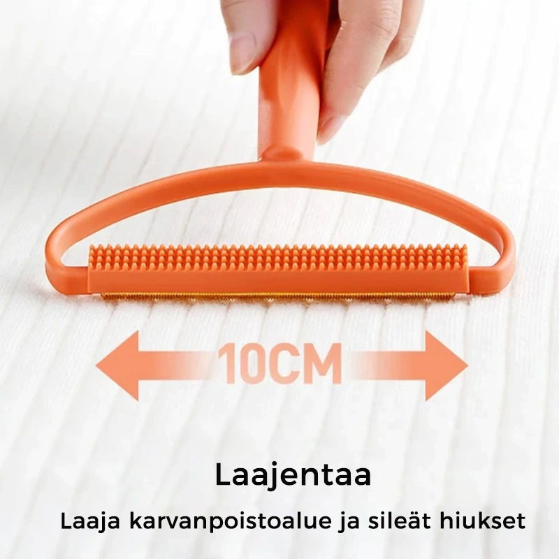 Mini håndholdt fnug- og dyrehårfjerner, blå håndtag, tosidigt kobberblad og børste.