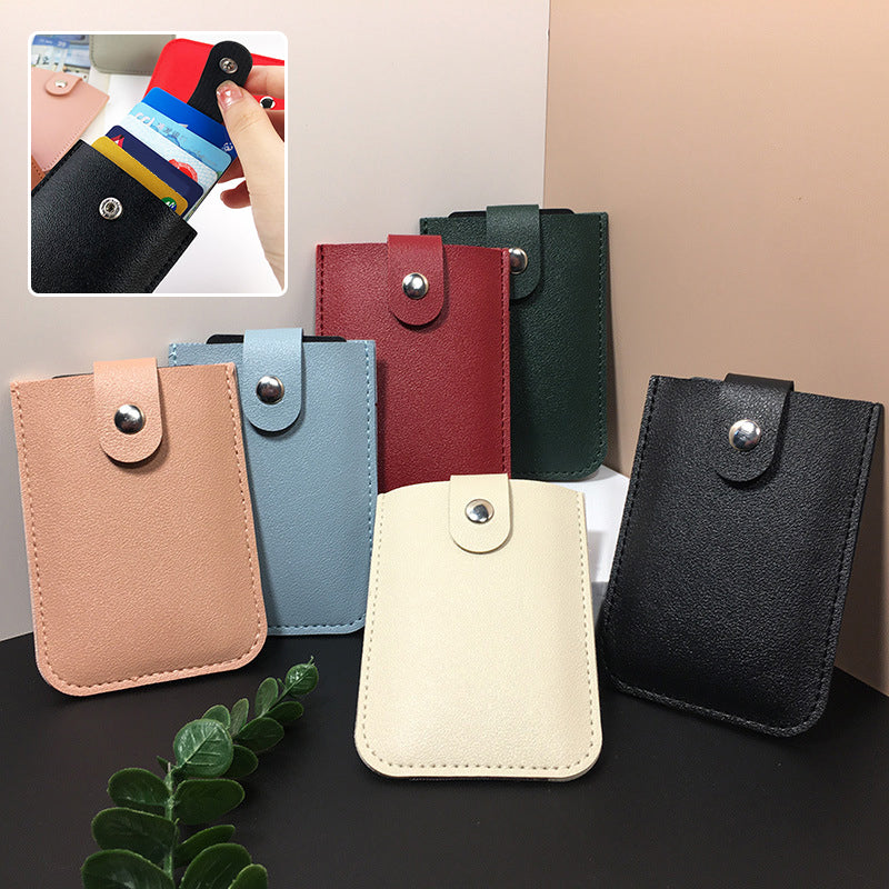 Minimalistinen slim monikorttikotelo unisex PU-nahkaa, pitää 5 korttia, kompakti koko 11x7.5x1 cm, nappikiinnitys.