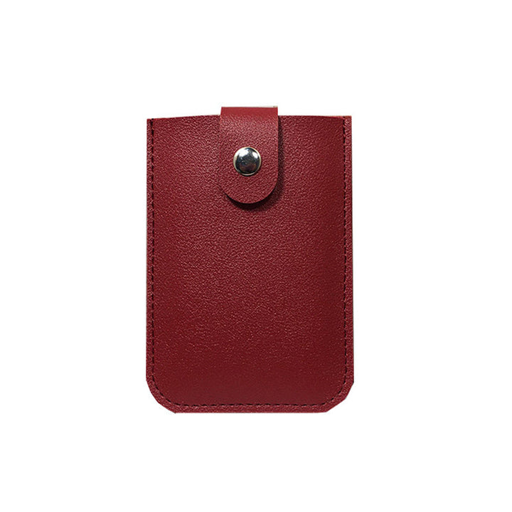 Minimalistinen slim monikorttikotelo unisex PU-nahkaa, pitää 5 korttia, kompakti koko 11x7.5x1 cm, nappikiinnitys.