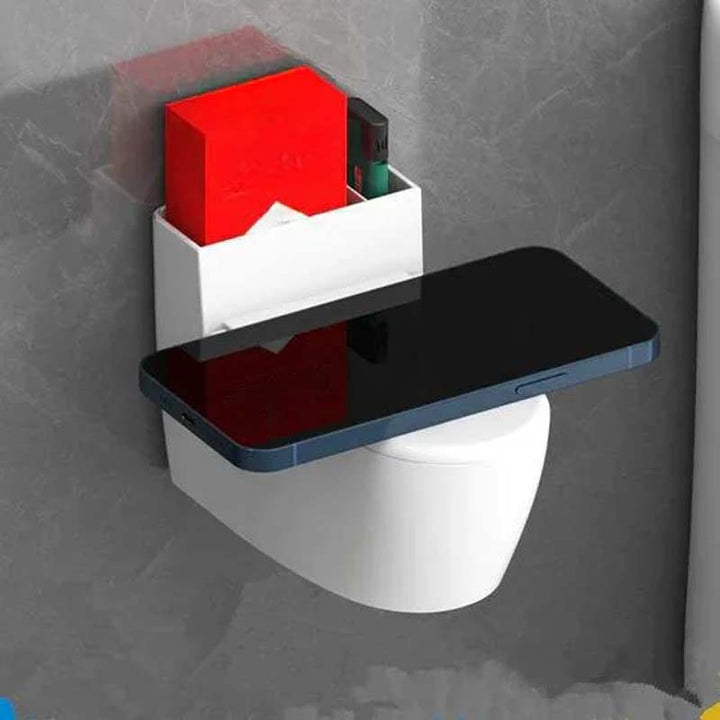 Moderne sølv-guld-hvid toilet askebæger, der ligner et miniaturetoilet, lavet af holdbart ABS-plast.