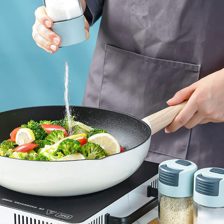 Moderne salt shaker, elegant glas og holdbar ABS plast, ergonomisk design til køkkenet, 100 ml kapacitet.