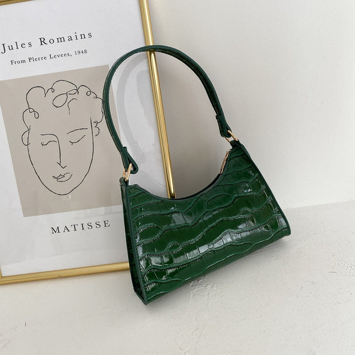 Moderne rummelig damehåndtaske i kunstlæder, stilfuldt design, kort rem, velegnet til hverdagsbrug og fest.