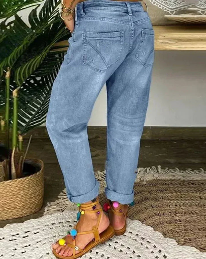 Moderne dame baggy jeans, løs blå model, behagelig og afslappet pasform perfekt til hverdagsbrug og byture.