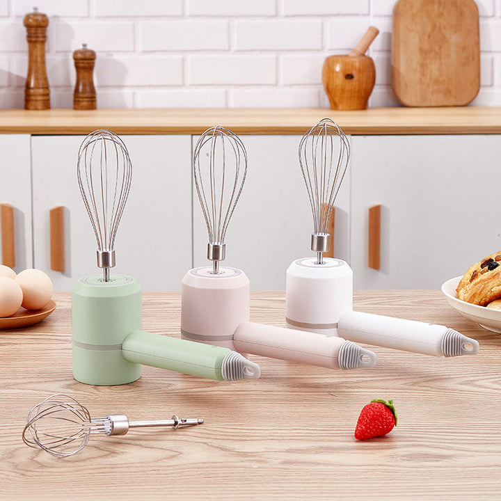 Multifunktionel 3-i-1 elektrisk blender, inkluderer piskeris, blender og hakker; sort bas, rustfrit stål.