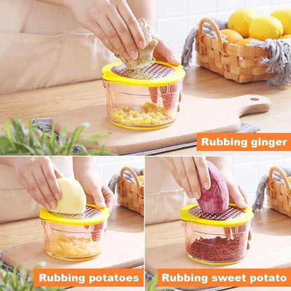 Monikäyttöinen keittiötyökalu maissille, väriltään keltainen ja sininen, joka raastaa ja viipaloi tehokkaasti.