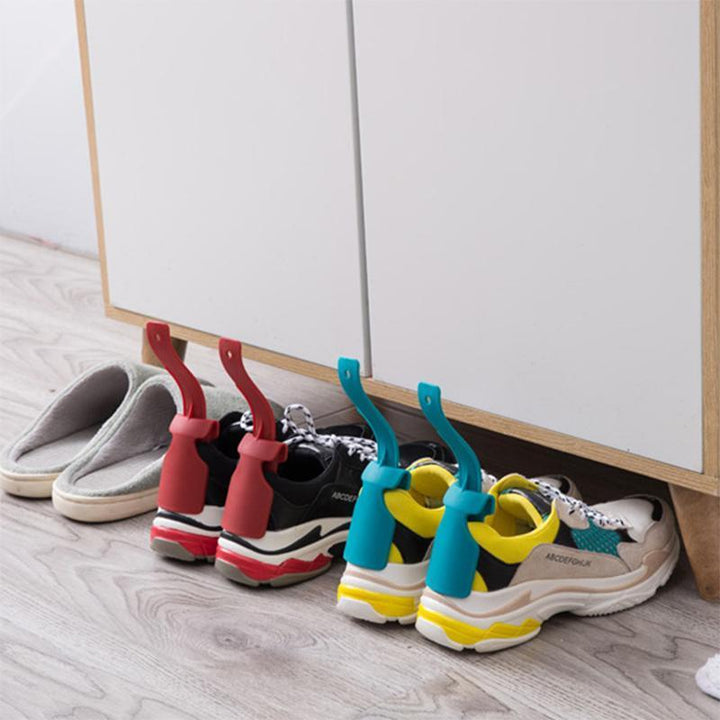 Multifunktionelt skohorn, ergonomisk buet design, nemt at bruge, holdbart PP-materiale, passer til alle sko.