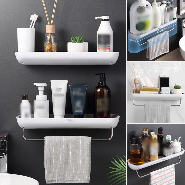 Multifunktionel klæbehyllede organizer i sort, holdbart PET-materiale, åbent design med drænhuller.