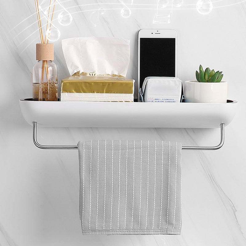 Multifunktionel klæbehyllede organizer i sort, holdbart PET-materiale, åbent design med drænhuller.