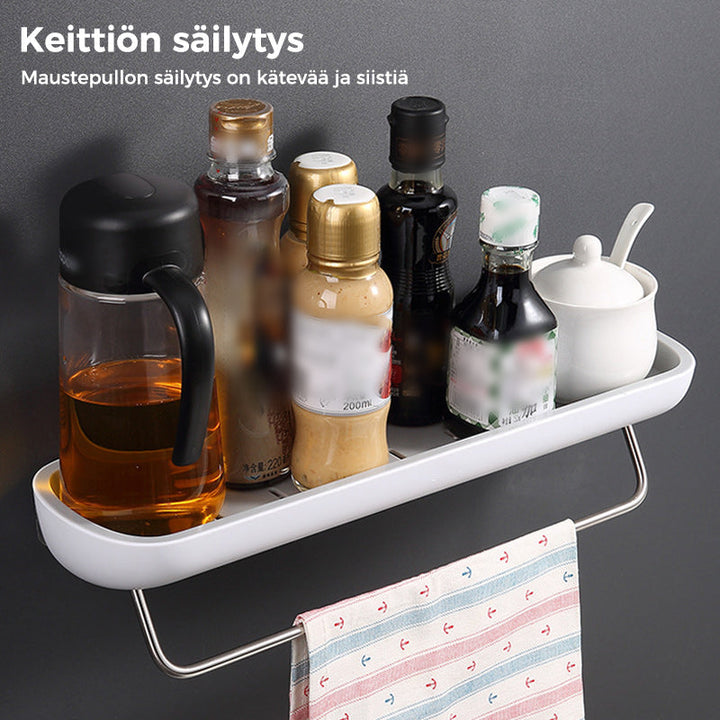 Multifunktionel klæbehyllede organizer i sort, holdbart PET-materiale, åbent design med drænhuller.