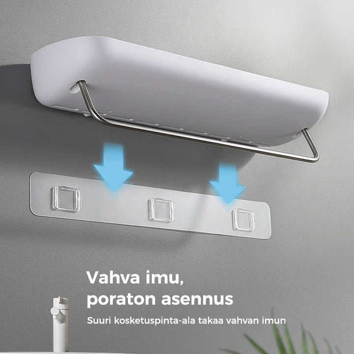 Multifunktionel klæbehyllede organizer i sort, holdbart PET-materiale, åbent design med drænhuller.