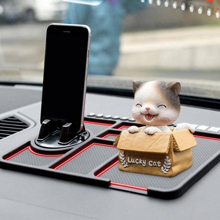 Multifunktionel skridsikker måtte til mobiltelefonholder i bilen; sort silikonemateriale; nem at placere på instrumentbrættet.
