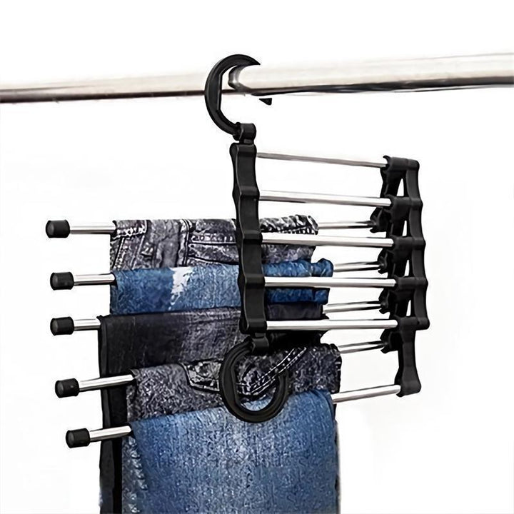 Multifunktionel sort/hvid tøjbøjle, pladsbesparende, holder op til 5 par, ABS og rustfrit stål.